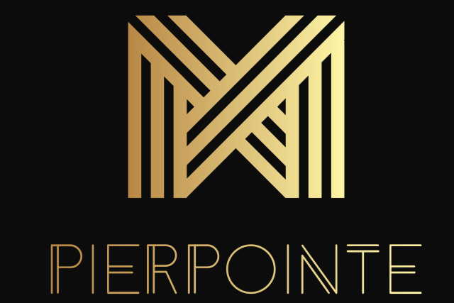 Pierpointe team standing side by side with Pierpointe logo shirts